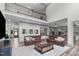 Expansive living room with hardwood floors, wrought iron railing, and an open concept design at 4105 Bankshire Ln, Raleigh, NC 27603