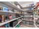 Walk-in pantry features ample shelving for maximum food storage at 4105 Bankshire Ln, Raleigh, NC 27603