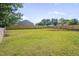 Expansive green backyard with a newly-installed wooden privacy fence at 414 Craven St, Durham, NC 27704