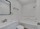 Clean, bright bathroom featuring a shower-tub combo and single sink vanity at 414 Craven St, Durham, NC 27704