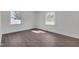 Bedroom boasts vinyl floors and two bright windows at 414 Craven St, Durham, NC 27704
