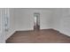 Bright bedroom featuring hardwood floors and ample natural light streaming through the window at 414 Craven St, Durham, NC 27704