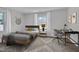 Cozy bedroom with modern decor, natural light, and a dedicated workspace at 414 Craven St, Durham, NC 27704