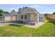 Charming bungalow features dual covered front porches and a grassy front lawn at 414 Craven St, Durham, NC 27704
