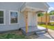 Charming front entrance with a covered porch and well-maintained landscaping at 414 Craven St, Durham, NC 27704