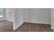 Bright living room featuring new hardwood floors, fresh paint, and bright natural light at 414 Craven St, Durham, NC 27704