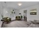 Stylish living room featuring modern decor, a decorative fireplace, and hardwood floors at 414 Craven St, Durham, NC 27704