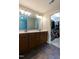 Bathroom featuring a double sink vanity and a walk-in closet at 486 S Denise Ave, Coats, NC 27521
