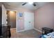 bedroom with a ceiling fan, carpet, and Stitch decor at 486 S Denise Ave, Coats, NC 27521