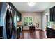Modern kitchen features stainless steel appliances, granite counters, and a cozy breakfast nook with deck access at 486 S Denise Ave, Coats, NC 27521
