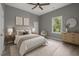 Cozy bedroom showcasing a comfortable bed, natural light, and stylish decor at 508 Buena Vista Ave, Rocky Mount, NC 27801