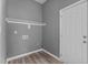 The Utility Room is simple and utilitarian with a small overhead shelf at 508 Buena Vista Ave, Rocky Mount, NC 27801