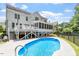 Beautiful backyard with an in-ground pool, fenced-in yard and deck at 513 Lake Gaston Dr, Fuquay Varina, NC 27526