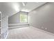 Attic bonus room with built-in storage and lots of natural light at 513 Lake Gaston Dr, Fuquay Varina, NC 27526