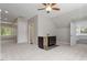 Large bonus room with wet bar, carpeted floors and natural light at 513 Lake Gaston Dr, Fuquay Varina, NC 27526