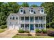Charming two-story traditional home with a welcoming front porch at 513 Lake Gaston Dr, Fuquay Varina, NC 27526