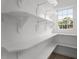 Pantry featuring white shelving for storage at 513 Lake Gaston Dr, Fuquay Varina, NC 27526