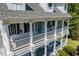Charming front porch with classic white columns, offering a welcoming entrance to the home at 513 Lake Gaston Dr, Fuquay Varina, NC 27526