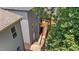 Aerial view of exterior with wood staircase leading to screened porch at 516 Culmore Dr, Fuquay Varina, NC 27526