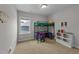 Playful bedroom featuring a loft bed, bright colored blocks, and books at 516 Culmore Dr, Fuquay Varina, NC 27526