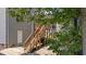 Wood staircase on the rear of a home with access to a screened porch at 516 Culmore Dr, Fuquay Varina, NC 27526