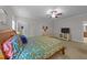 Comfortable main bedroom with a ceiling fan and classic style decor at 516 Culmore Dr, Fuquay Varina, NC 27526