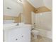 A well-lit bathroom featuring a tub/shower combo with neutral walls and flooring at 5405 Overdale Ln, Raleigh, NC 27603