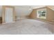 Large bonus room featuring neutral walls, carpet and natural light at 5405 Overdale Ln, Raleigh, NC 27603