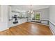 Bright kitchen with stainless steel appliances, granite countertops, and eat-in dining area at 5405 Overdale Ln, Raleigh, NC 27603