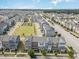 Aerial view of townhomes, park, playground, and streets at 5908 Giddings St, Raleigh, NC 27616