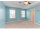 Bright bedroom features two windows, offering ample natural light at 5908 Giddings St, Raleigh, NC 27616