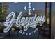 Close-up of the logo on the window highlighting the Heyday Brewing brand at 5908 Giddings St, Raleigh, NC 27616