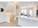 Open concept kitchen with granite countertops, stainless appliances, and natural light at 5908 Giddings St, Raleigh, NC 27616