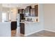 Open concept kitchen with stainless steel appliances and granite countertops, perfect for entertaining at 5908 Giddings St, Raleigh, NC 27616