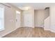 Bright, open floor plan with wood-look flooring and ample natural light at 5908 Giddings St, Raleigh, NC 27616