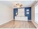 Well-lit office area featuring a custom built-in desk and storage space at 5908 Giddings St, Raleigh, NC 27616