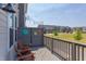 Charming outdoor patio with wood chairs and decorative outdoor lighting at 5908 Giddings St, Raleigh, NC 27616