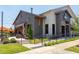 Attractive storefront with a gray façade, awning, and outdoor seating, offering a welcoming and functional commercial space at 5908 Giddings St, Raleigh, NC 27616