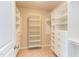 Spacious walk-in closet with custom shelving and ample storage at 5908 Giddings St, Raleigh, NC 27616