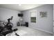 Well-equipped gym area with natural light, workout equipment, and space for fitness activities at 60 Falling Leaf Ln, Benson, NC 27504
