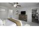 Relaxing main bedroom with a view into the ensuite bathroom and open living area at 60 Falling Leaf Ln, Benson, NC 27504