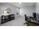 Cozy office space featuring stylish shelving, neutral walls, and a comfortable workspace at 60 Falling Leaf Ln, Benson, NC 27504