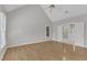 Spacious bedroom featuring hardwood floors, vaulted ceilings and an adjacent bathroom with tub and shower at 6201 Bayswater Trail Trl, Raleigh, NC 27612