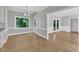 Bright breakfast area features a large window overlooking the landscaped yard at 6201 Bayswater Trail Trl, Raleigh, NC 27612