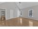 Expansive primary bedroom with vaulted ceilings, hardwood floors, and ample natural light at 6201 Bayswater Trail Trl, Raleigh, NC 27612