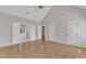 Spacious main bedroom featuring vaulted ceilings, wood floors, and connecting to the bath at 6201 Bayswater Trail Trl, Raleigh, NC 27612