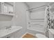 Updated bathroom features a sink, bathtub, and shower at 6328 Jones Farm Rd, Wake Forest, NC 27587