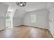 Upstairs bedroom with plenty of natural light at 6328 Jones Farm Rd, Wake Forest, NC 27587