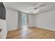 Spacious bedroom with neutral colors and large window at 6328 Jones Farm Rd, Wake Forest, NC 27587