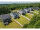 Wide aerial view showing homes with spacious backyards in a serene community setting at 74 Permit Ct, Chapel Hill, NC 27517